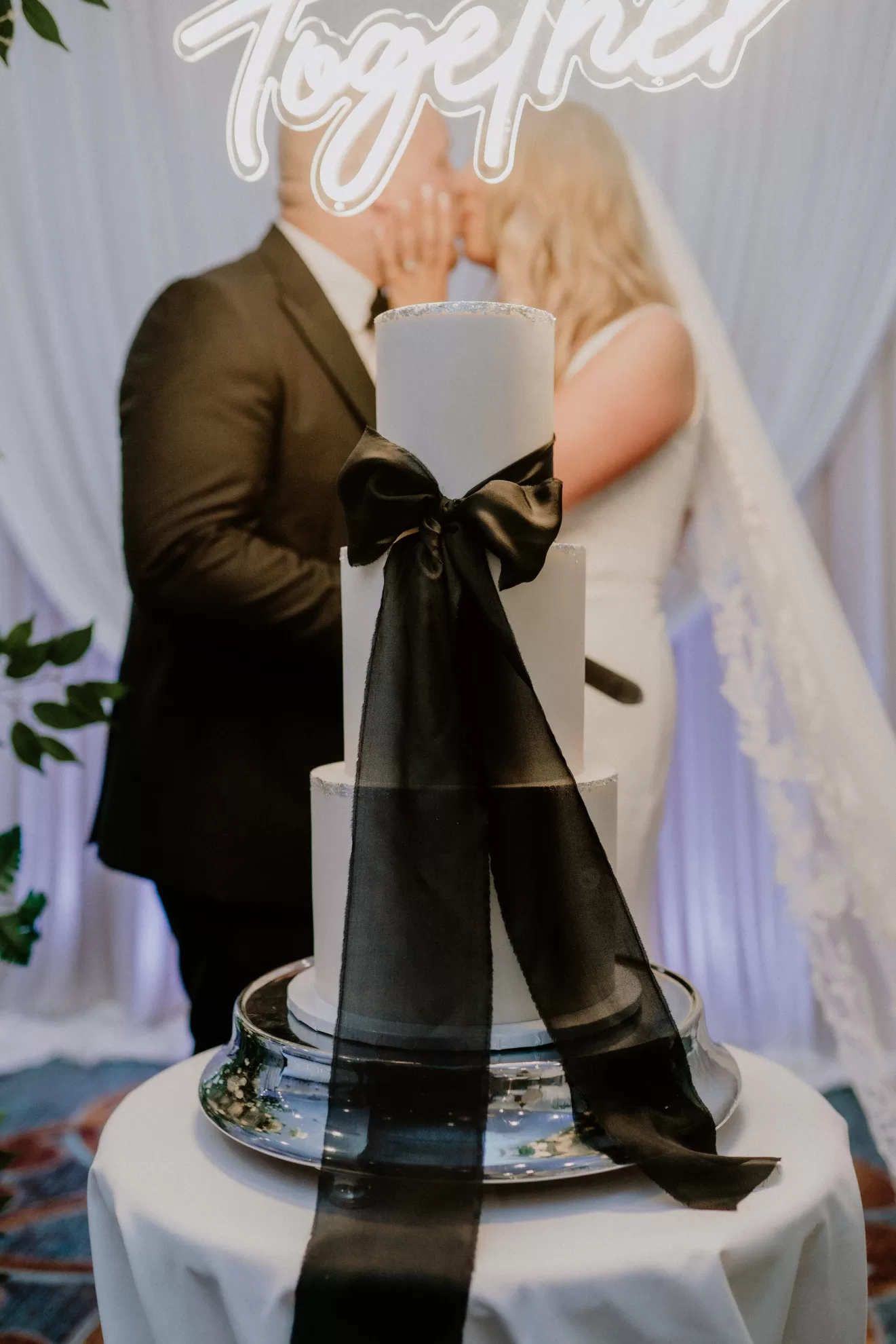 The wedding cake and cutting of the wedding cake at Nicola and Leonard's wedding