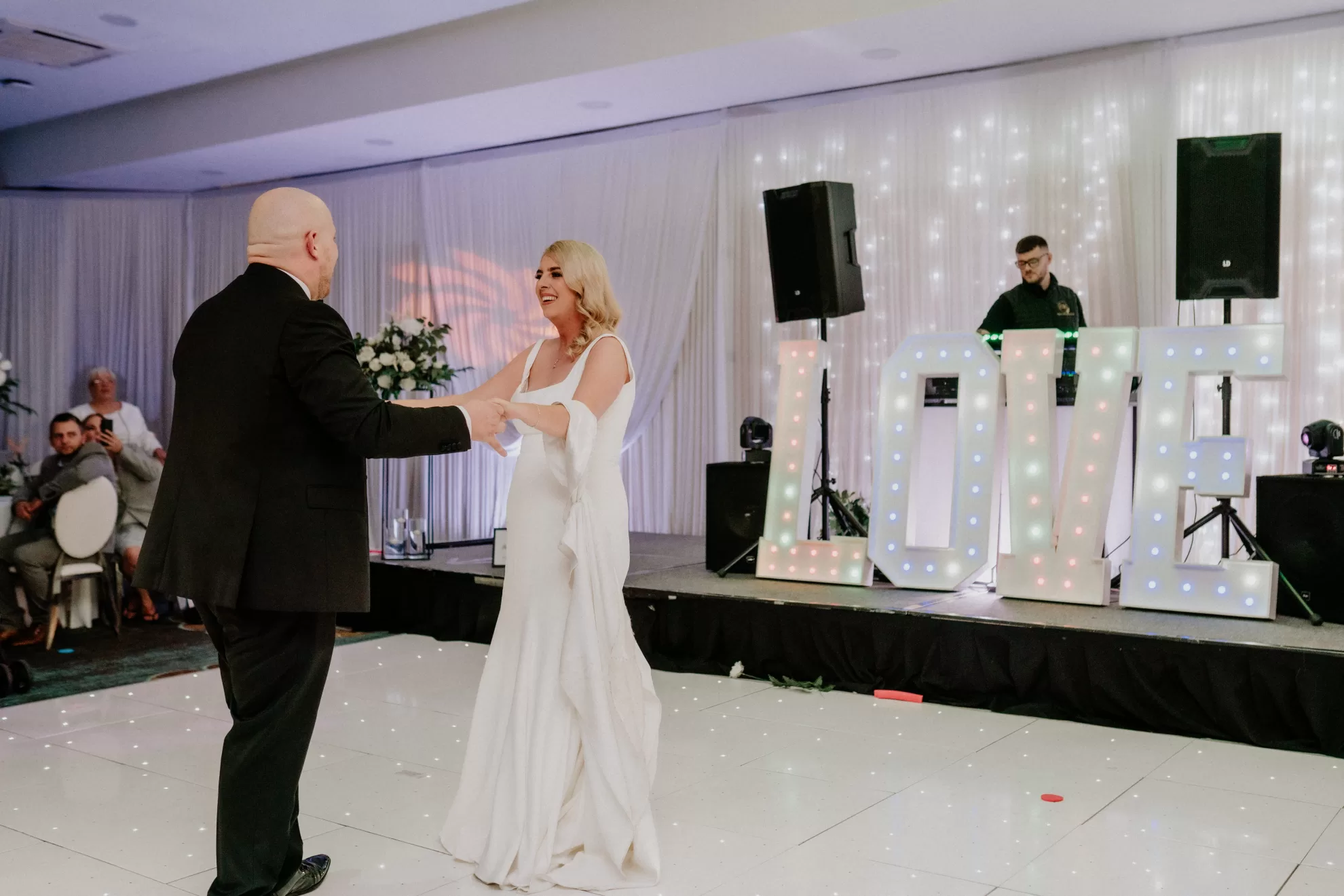 Nicola and Leonard enjoying their first dance at their wedding
