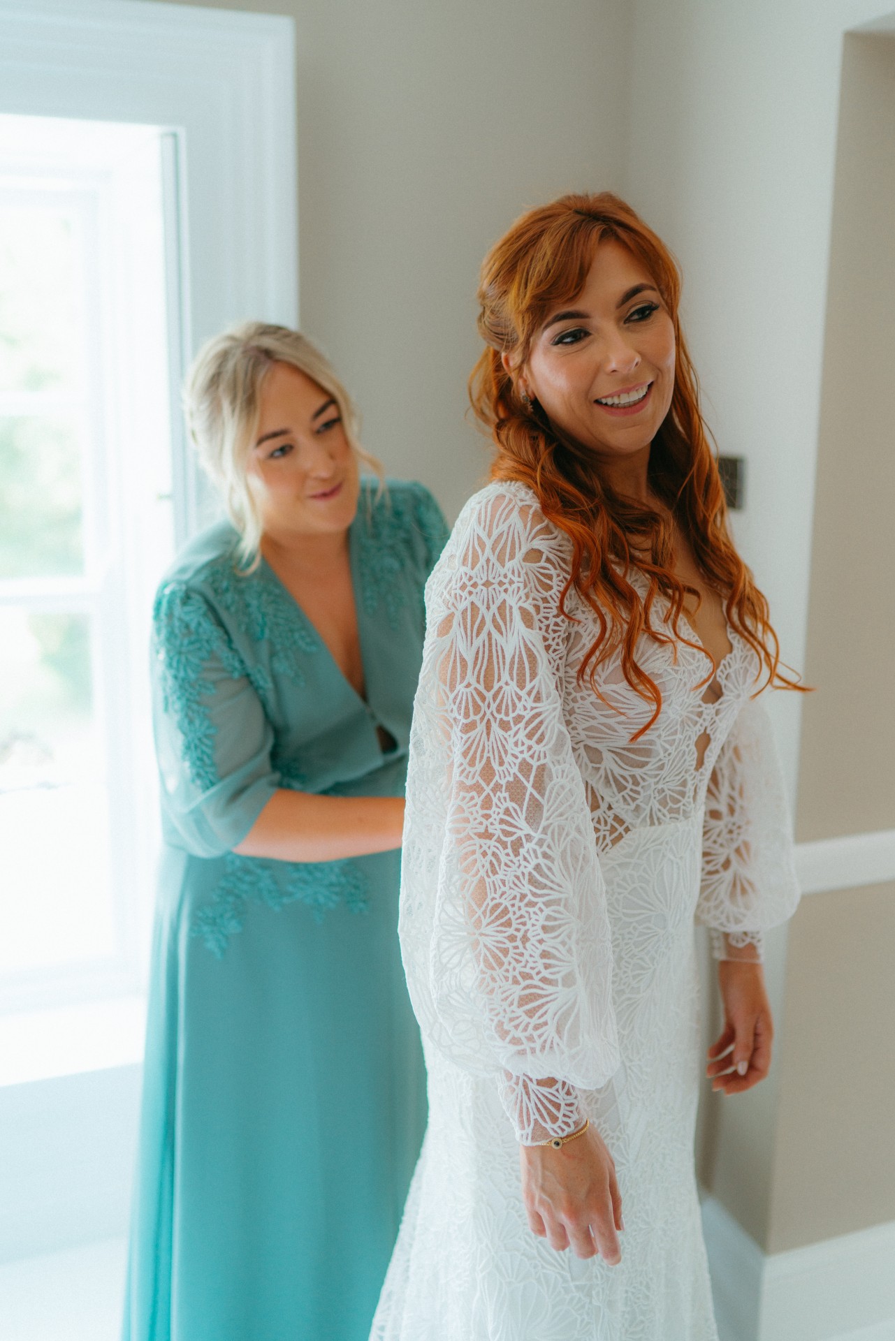 Charmaine getting her wedding dress on